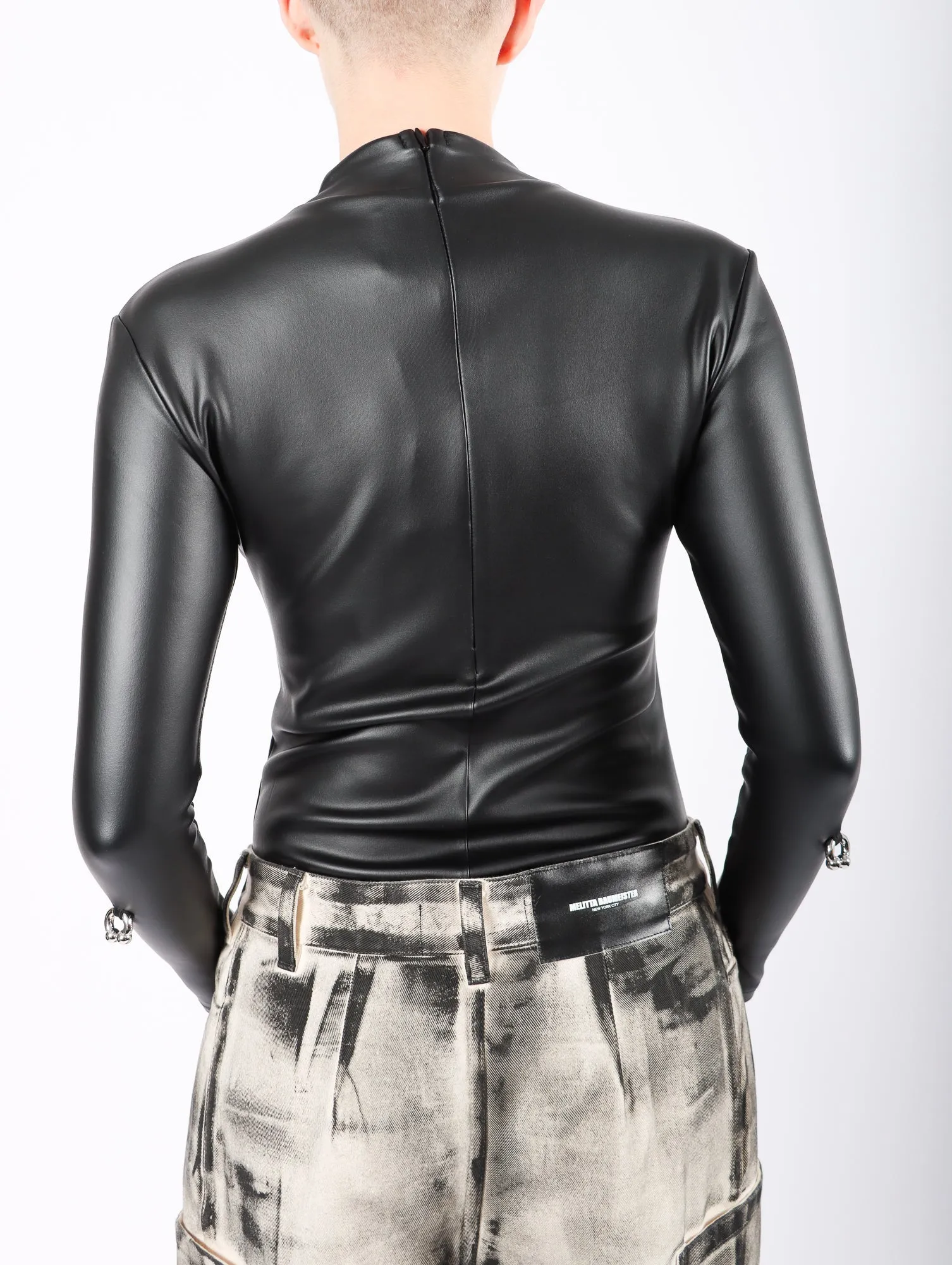 Pierced Pleather Bodysuit in Black by Melitta Baumeister